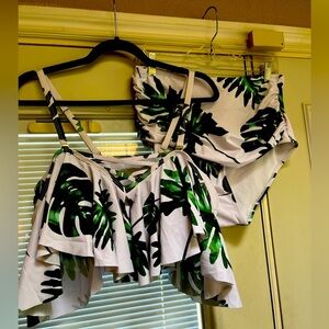 NWT. Two piece swim suit, removable pads Hygienic liner still attached. NWT